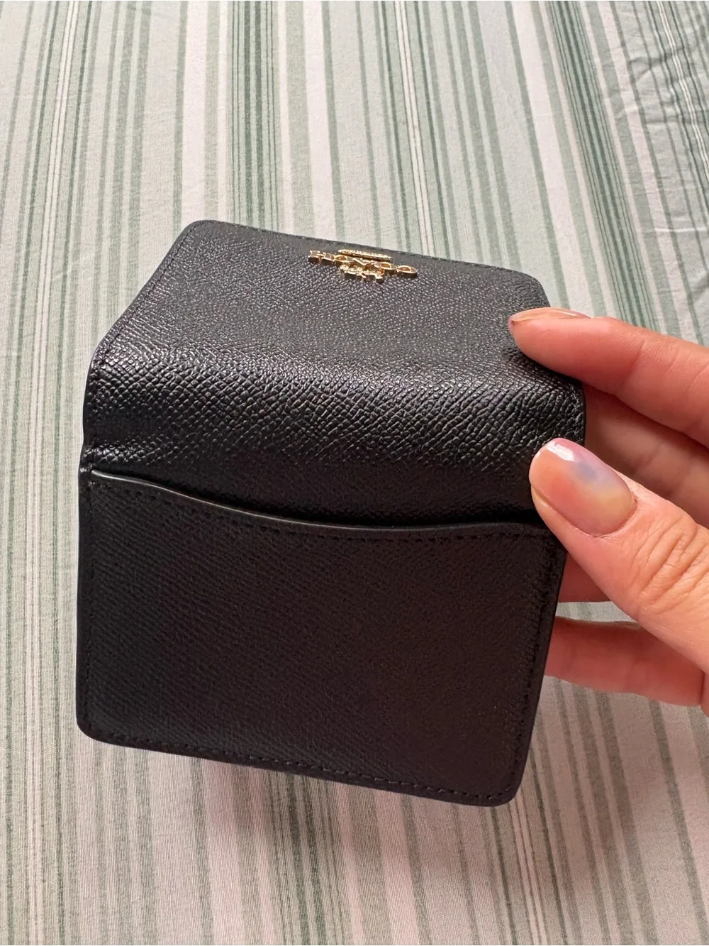Coach Black Leather Compact Wallet with Gold Logo Accent